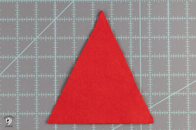 red triangle of felt on cutting mat