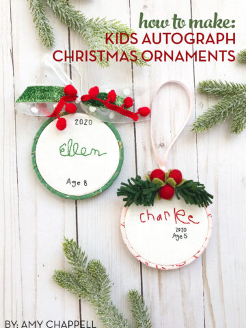 hand embroidered christmas ornaments with childrens names on white wood table