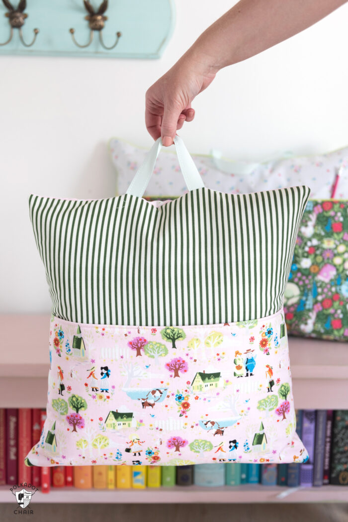 Reading pillow with ribbon attachment